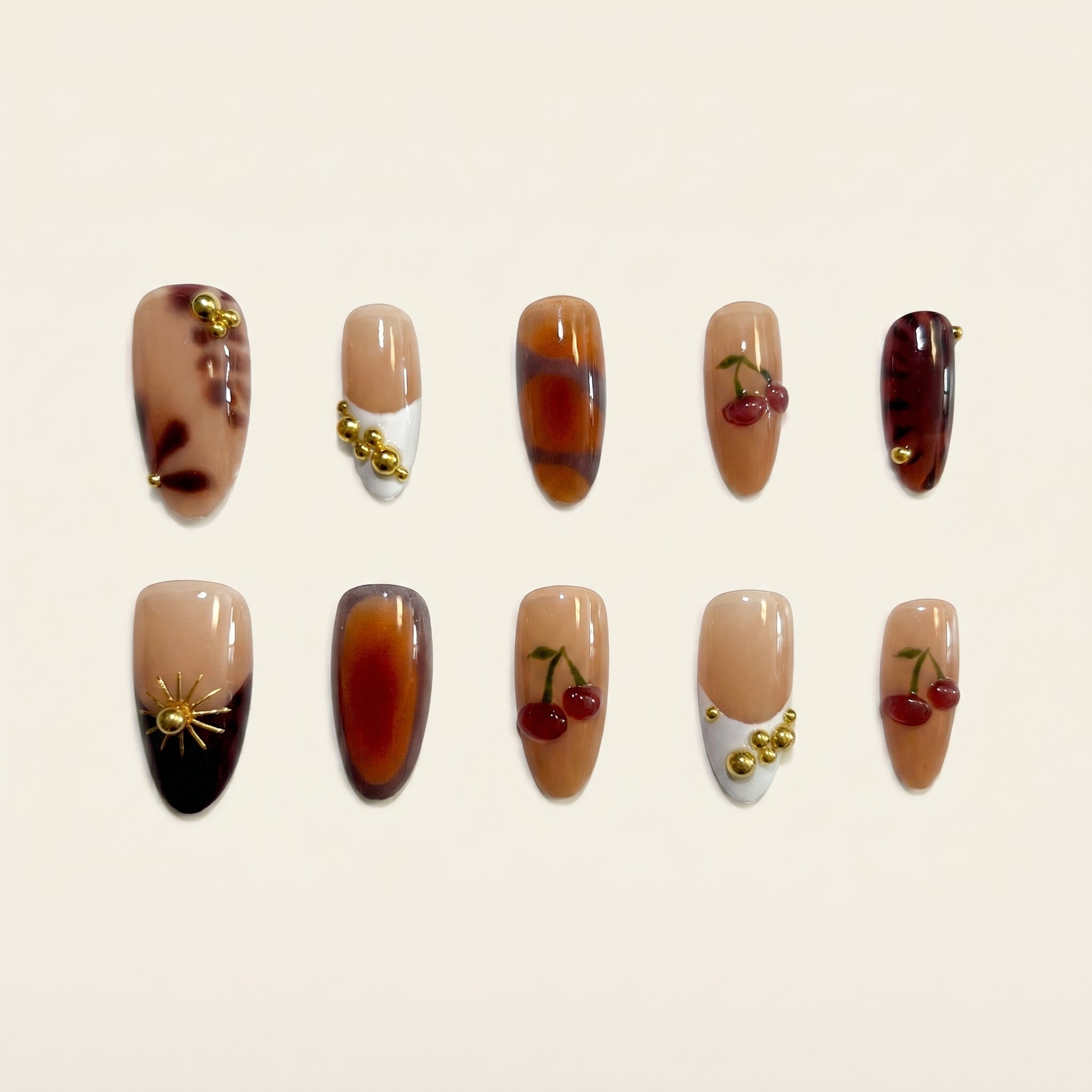 Edgy Cherry Sun Nails: Y2K Animal Print & Gold French